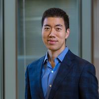 David liu cropped Photo of man in suit